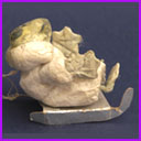 Antique Christmas ornament FROG on SLEDGE