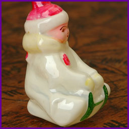 Antique Christmas ornament BOY on SLEDGE