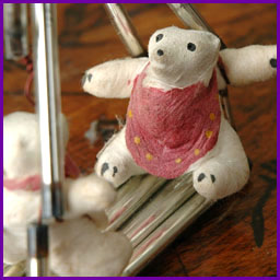 Antique Christmas ornament BEAR CUBS on SWING