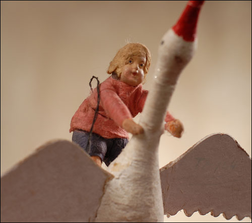 Antique Christmas ornament - BOY ON GOOSE