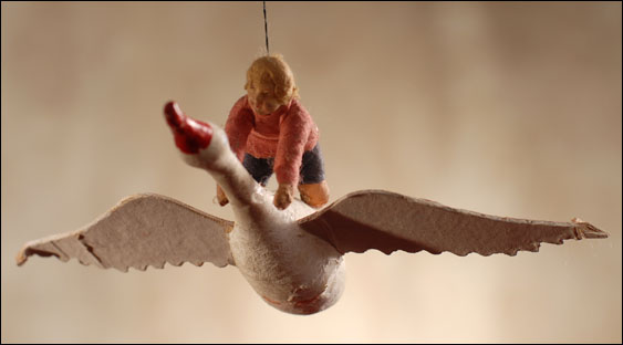 Antique Christmas ornament - BOY ON GOOSE