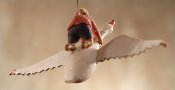 Antique Christmas ornament - BOY ON GOOSE