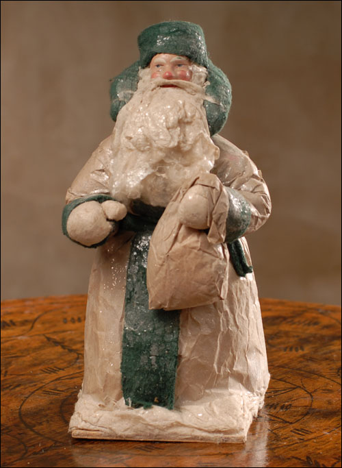 Antique Christmas cotton figure of Santa