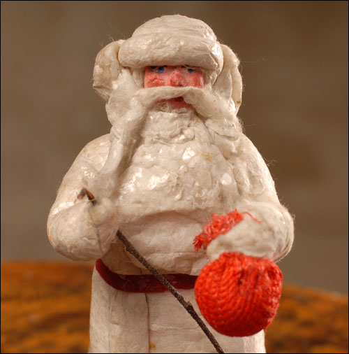 Antique Christmas cotton figure of Santa