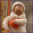 Antique cotton Christmas ornament GIRL WITH FLOWER