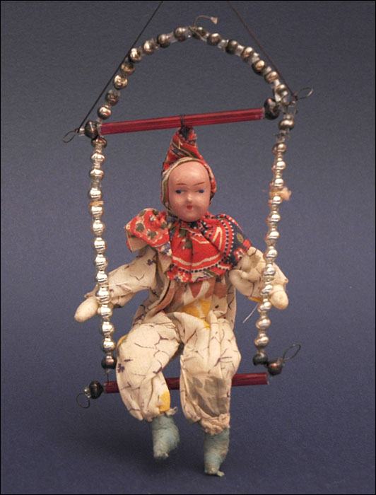 Antique Christmas ornament CLOWN on SWING