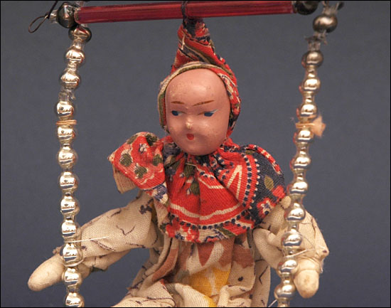 Antique Christmas ornament CLOWN on SWING