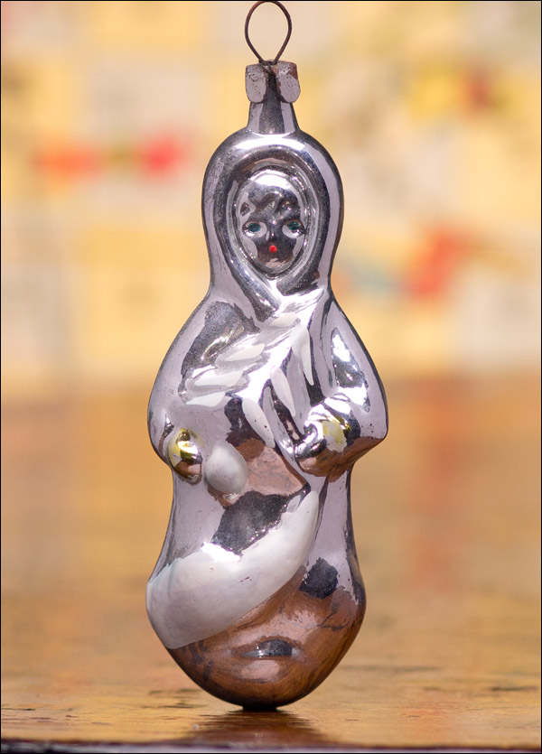 Antique Christmas silver glass ornament of SNOWGIRL