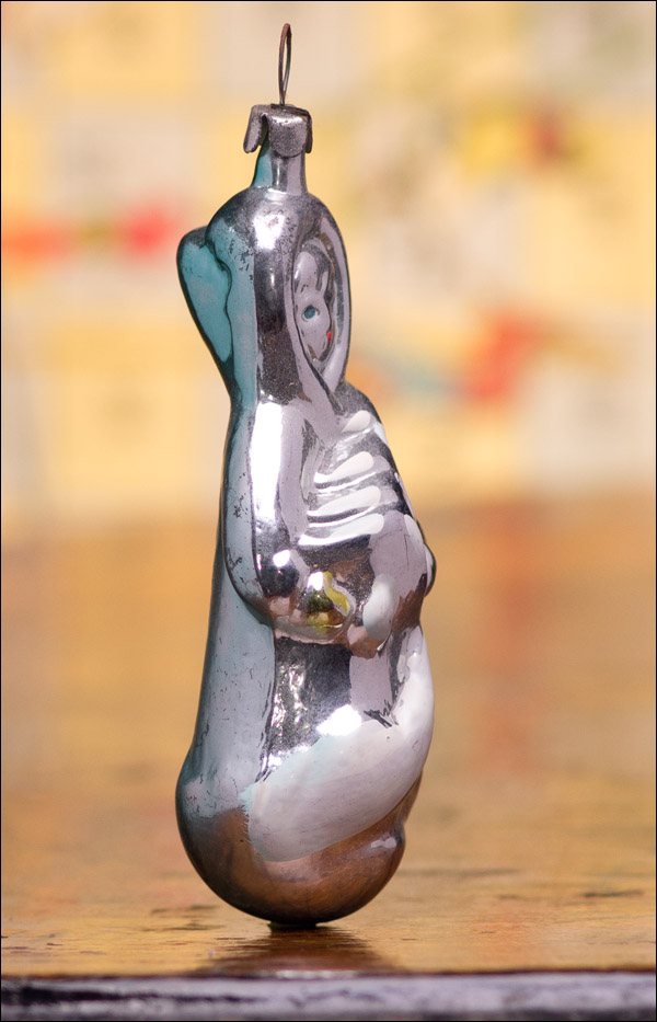 Antique Christmas silver glass ornament of SNOWGIRL