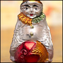 Antique German Christmas ornament CLOWN ON COMET