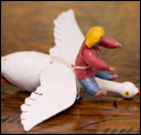 Antique cotton Christmas ornament BOY ON GOOSE