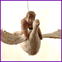 Antique Christmas ornament BOY on GOOSE