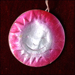 Antique Dresden Christmas ornament SUN