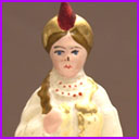 Antique Christmas ornament Girl in Traditional Dress