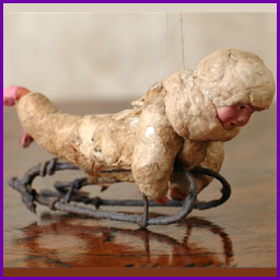 Antique Christmas ornament BOY on SLEDGE