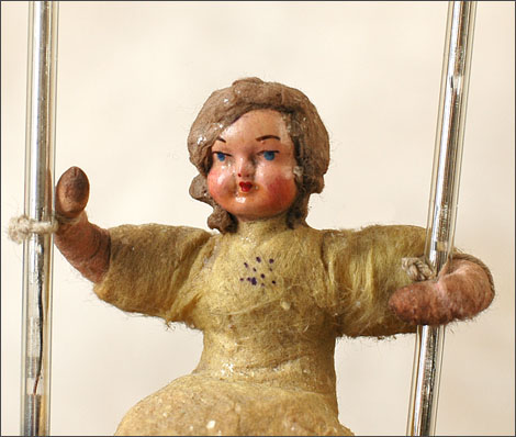 Antique Christmas ornament GIRL on SWING