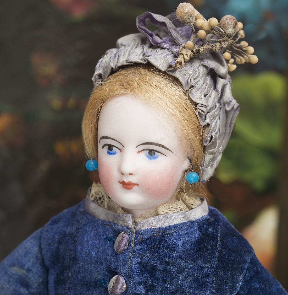 Small FG doll with painted eyes