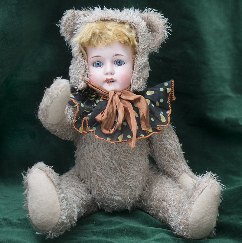 Antique Doll in Early mohair Teddy Bearsuit