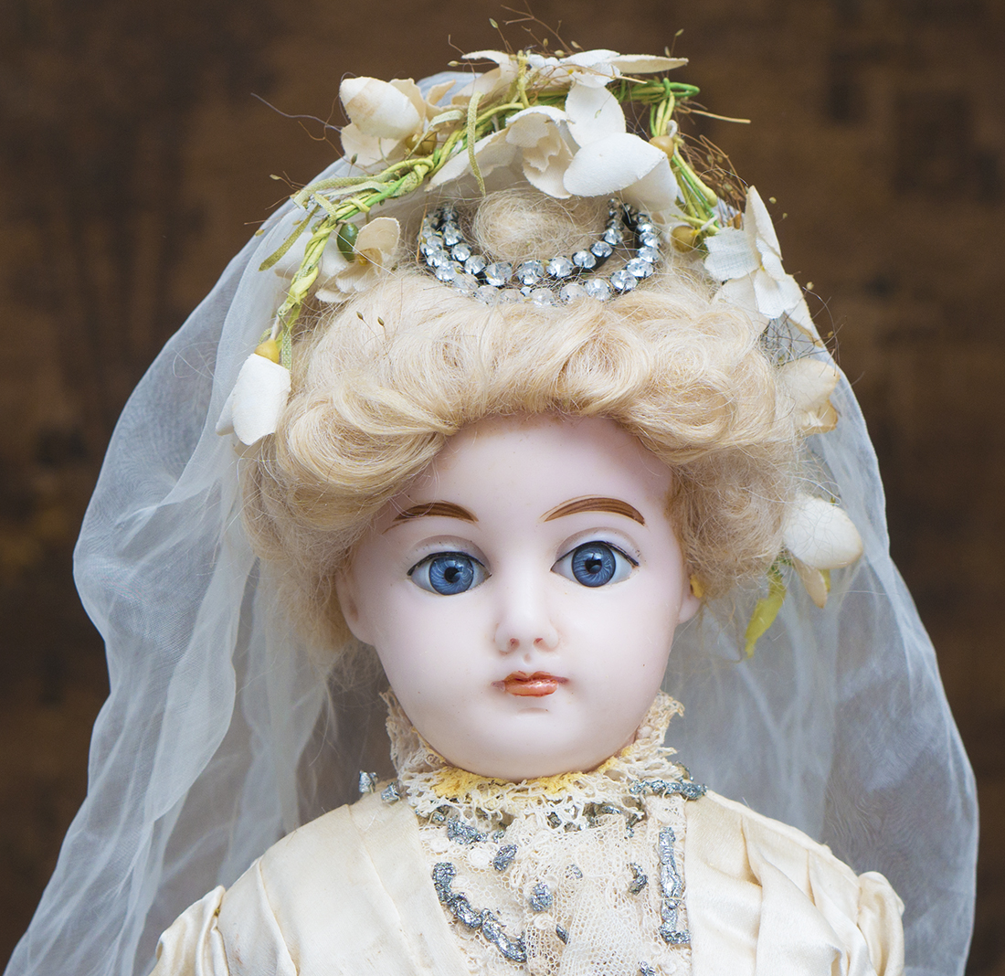 Antique Wax doll in wedding costume