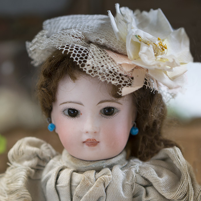 Solid domed bisque head doll