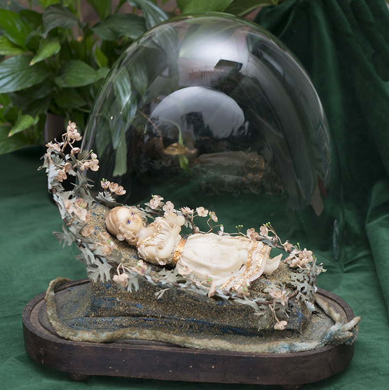 Antique Wax bebe with globe