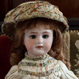 French DEP doll w/ dress Au Nain Bleu