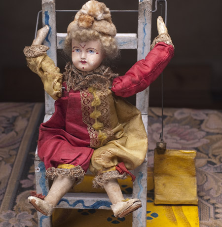 The Acrobat Clown on Chair