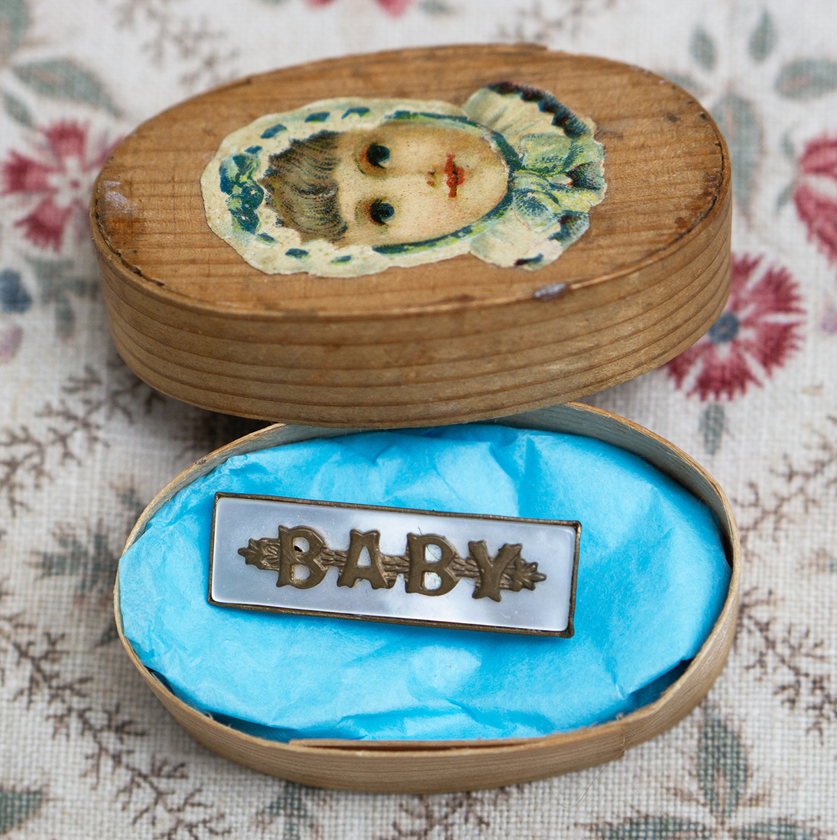 Bebe brooch