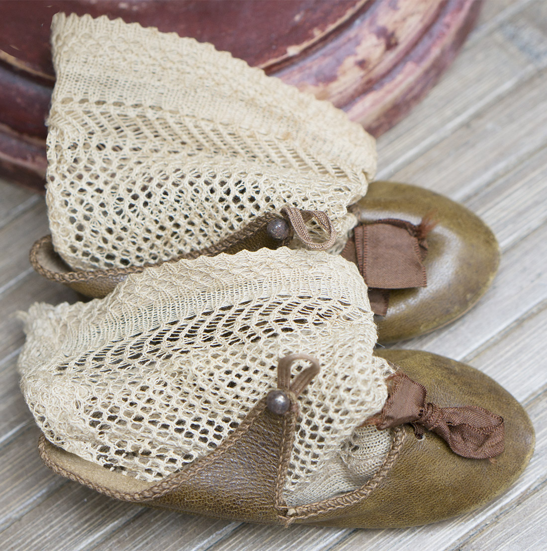 Antique doll shoes and socks