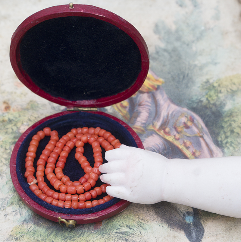 Antique doll coral beads neckline