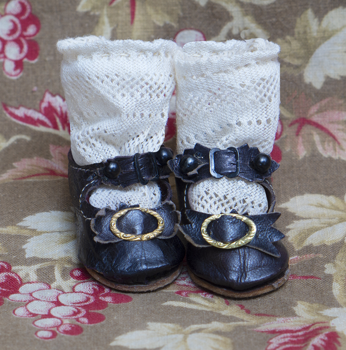 Antique doll shoes and socks