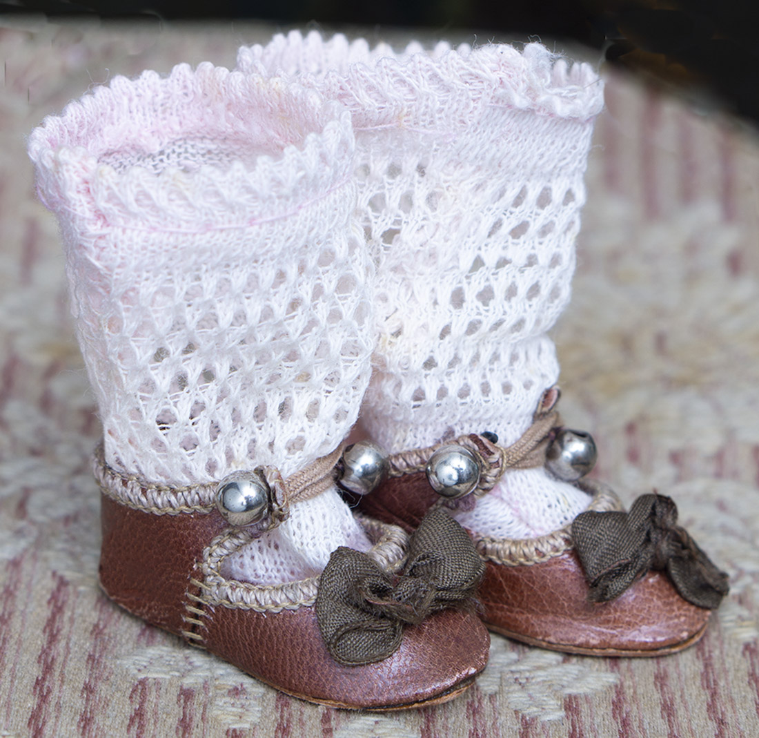 Antique doll shoes and socks