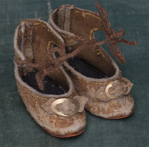 Antique small shoes for doll