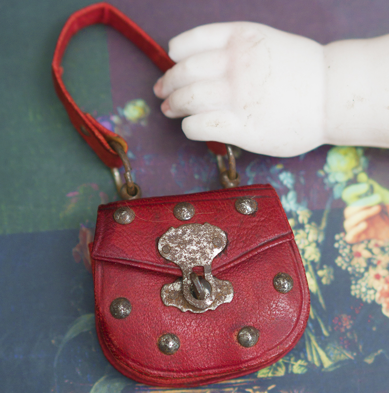 Antique doll red bag